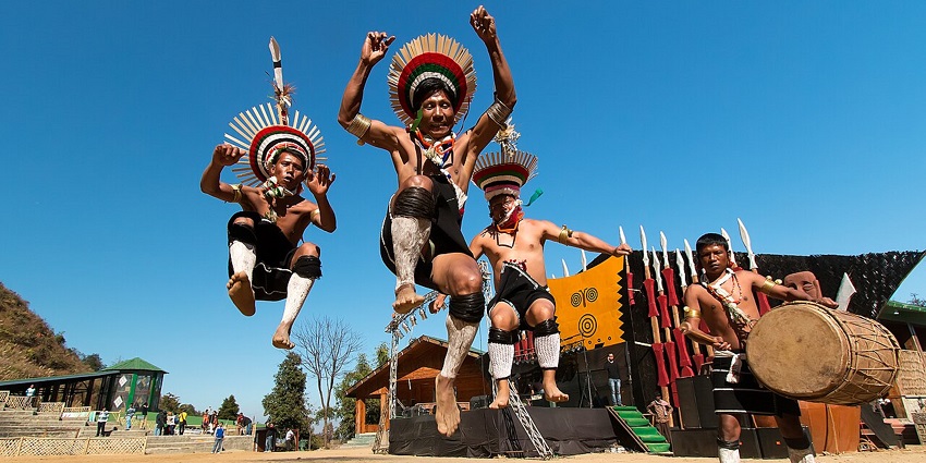Zeliang Naga Tribesmen perform their traditional dance during the Hornbill Festival in Nagaland.

