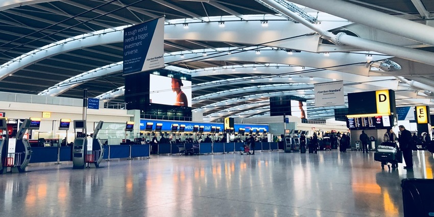 Departure area at Hubballi Airport with check-in counters and seating space in view.