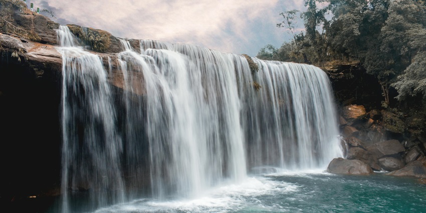 Jagatpura Waterfall flows through lush greenery in waterfalls in Rajasthan.
