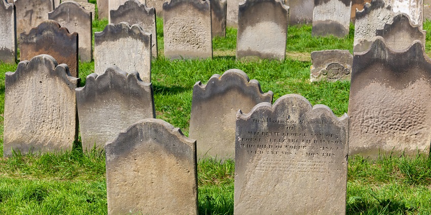Kalpalli Cemetery with old headstones and trees, one of the haunted places in Karnataka.