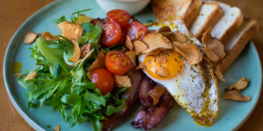 English breakfast served on a plate at Khorikaa, Ulubari restaurant.
