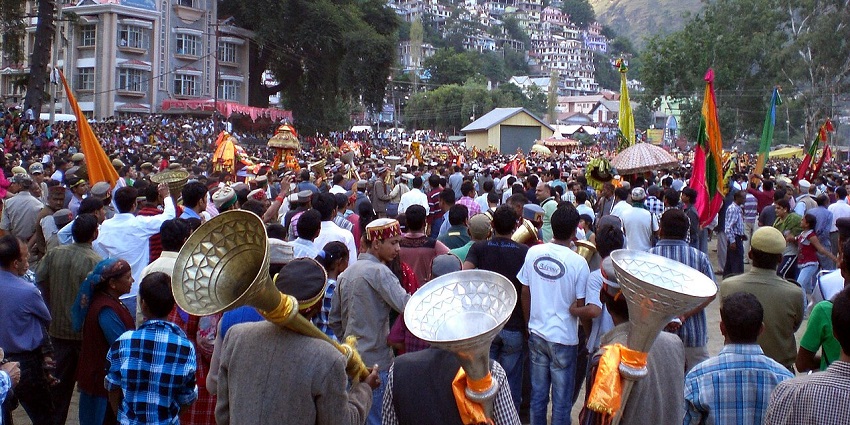 People with trumpets and cheerful moods gather at a ground during Kullu Dussehra, one of the festivals in Himachal Pradesh.
