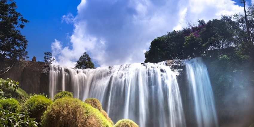 Small rocky waterfall in a green mountain valley, one of the picturesque waterfalls in Andaman.
