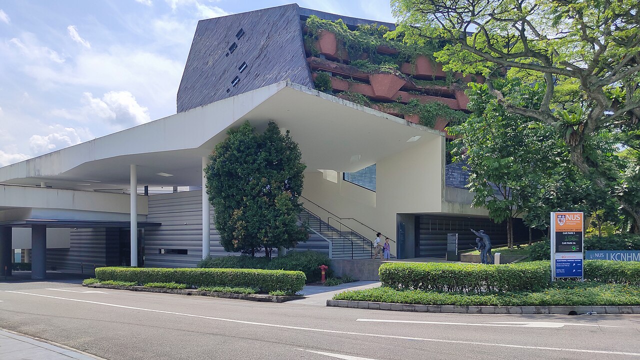 Exterior of Lee Kong Chian Natural History Museum featuring a unique eco-friendly roof, among the best museums in Singapore.