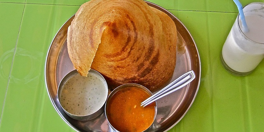 Masala dosa with chutney and drink at MTR 1924 Malaysia, one of the South Indian restaurants in Kuala Lumpur.