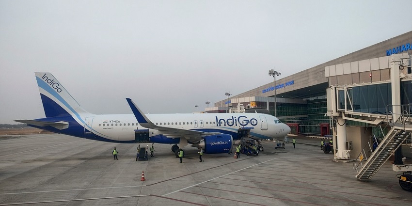 IndiGo Airbus A320 at Maharaja Bir Bikram Airport with staff handling ground services – airports in North East.