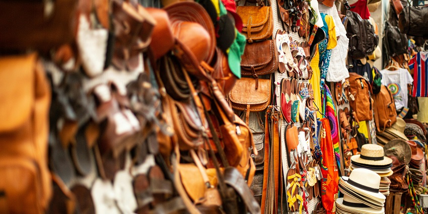 A variety of fashion products are displayed at Marina Souq, one of the top flea markets in Dubai.
