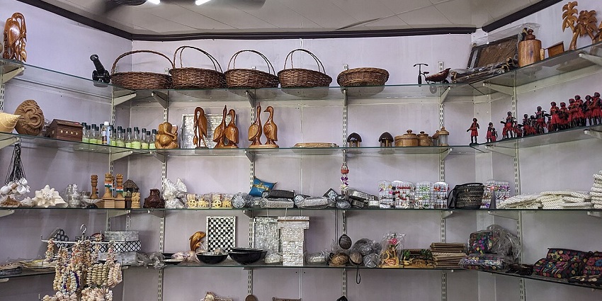 Interior view of a museum with display cases showing marine specimens and artefacts.