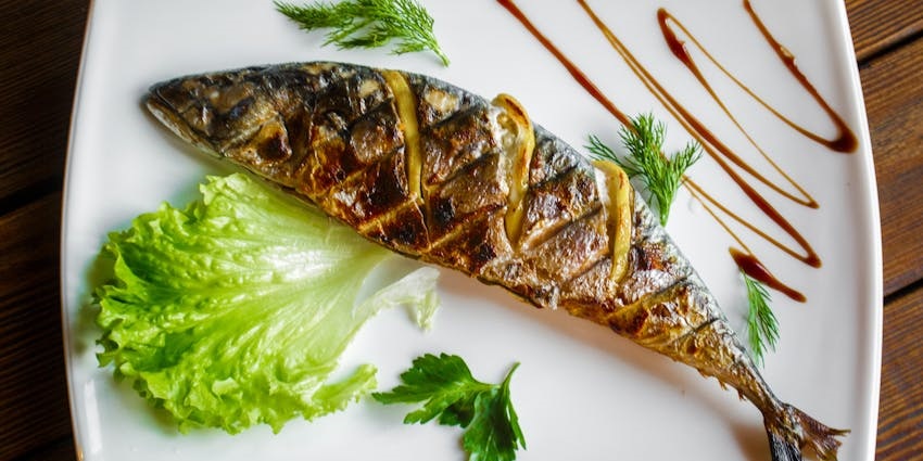 Grilled fish at Mising Kitchen, one of the best restaurants in Guwahati for dinner.