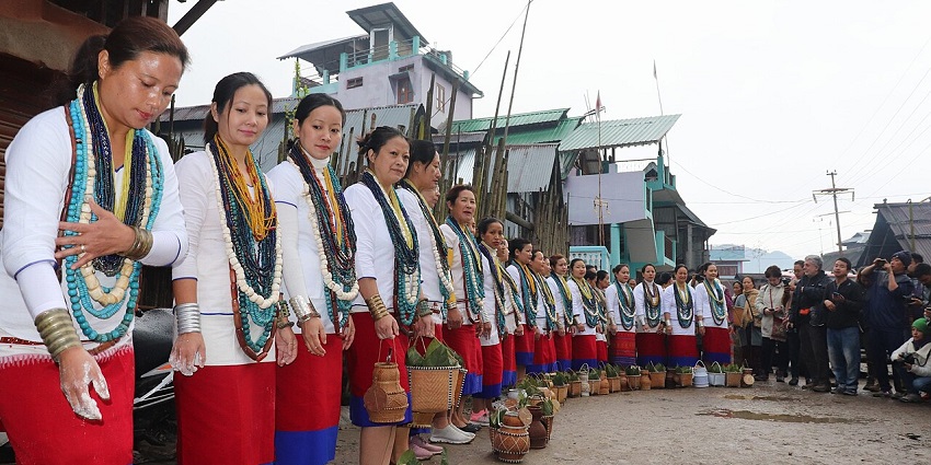 Women dressed in traditional attire perform a ritual during the Myoko Festival in Arunachal Pradesh.
