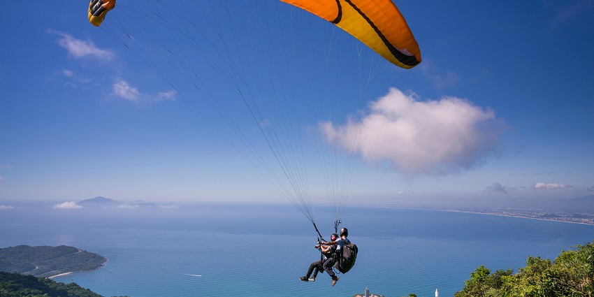 Paragliding in Karnataka at Mysore with stunning aerial views of the city and surrounding landscapes.