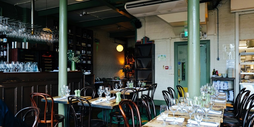 Interior view of Naga Kitchen with traditional decor, among the top family restaurants in Guwahati.