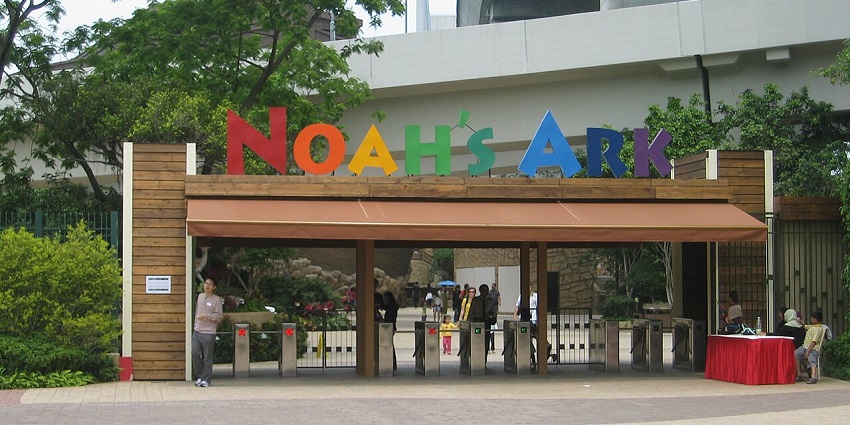 A wooden entrance gate with a colourful "Noah's Ark" sign leads to a turnstile area.