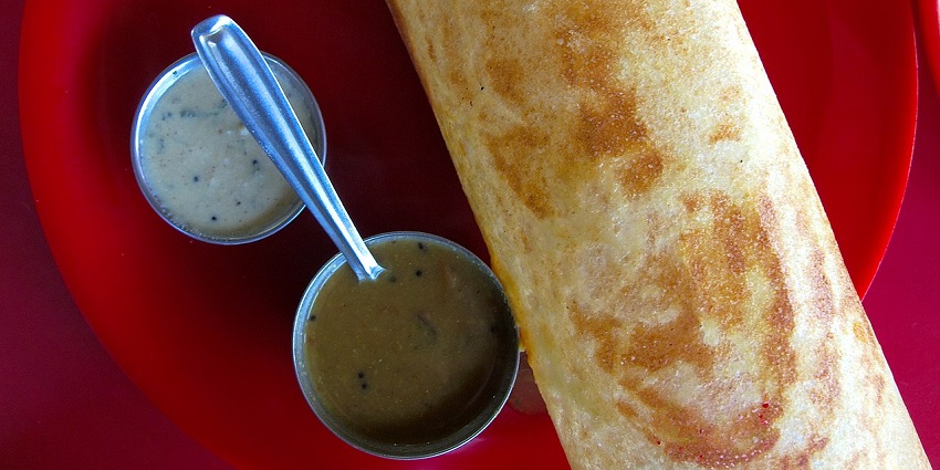 The crispy dosa is served with tamarind sambhar for breakfast in one of the best restaurants in Darjeeling Mall Road.
