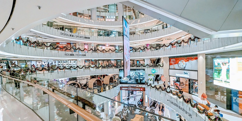 Visitors explore PMQ, a creative space and unique spot for shopping in Hong Kong.