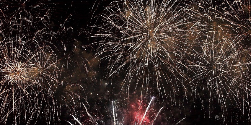 Fireworks light up the night sky at Panambur Beach for New Year in Karnataka.
