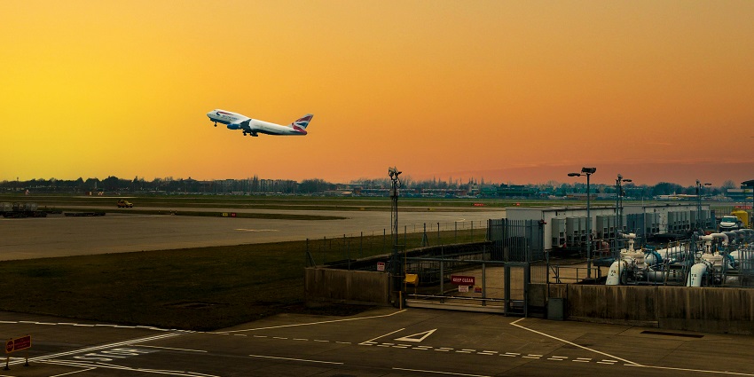 An airplane is taking off from the runway at Ngurah Rai, one of the main airports in Bali.

