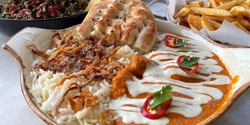 Biryani rice with curry and naan bread served at Rasoi Restaurant in Antalya.