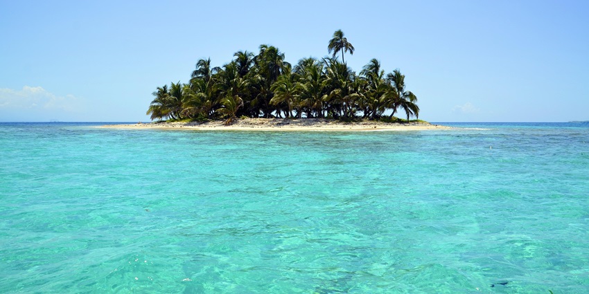 Pristine sandy beach and clear waters at Red Skin Island, one of the islands in the Andaman.