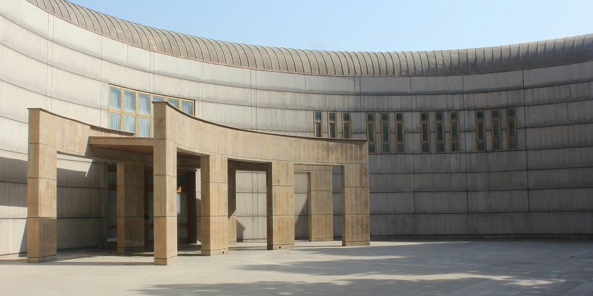 Courtyard of the Regional Science Centre and Science Museum with open space and exhibits.