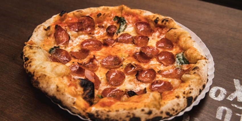 Wood fired pizza at Ristorante Tuscany, one of the best restaurants in Guwahati for lunch.