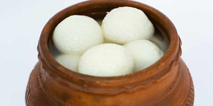 A pot full of rasgulla served at Sherowali Sweets And Restaurant in restaurants in Agartala.