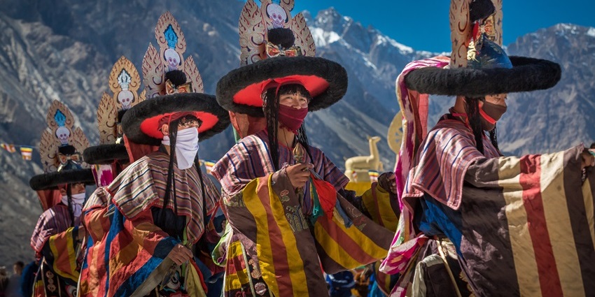 People celebrating Sindhu Darshan Festival on the banks of the Indus River, a vibrant festival in Ladakh.