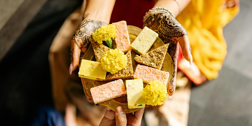 Assorted Indian sweets served on a plate during Dussehra celebration.