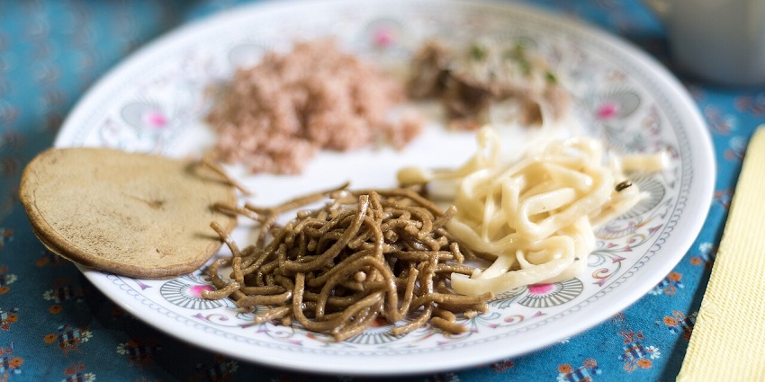 The varieties include curries, vegetables, bowls of chillies or spices, rice, etc.
