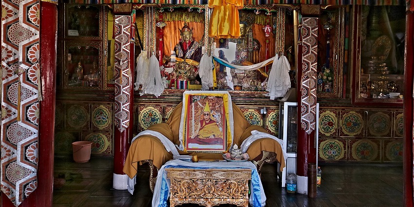 Interior of Vajra Bhairav Shrine at Spituk Monastery with decorated altar and statues.