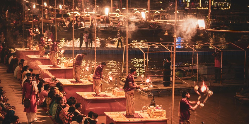 Ganga Aarti is taking place during Navratri at the Ganga Ghat in Varanasi, Uttar Pradesh.