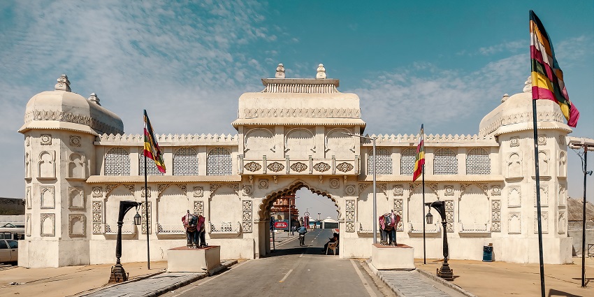 Entrance gate to the Great Rann of Kutch with clear skies and surrounding landscape.