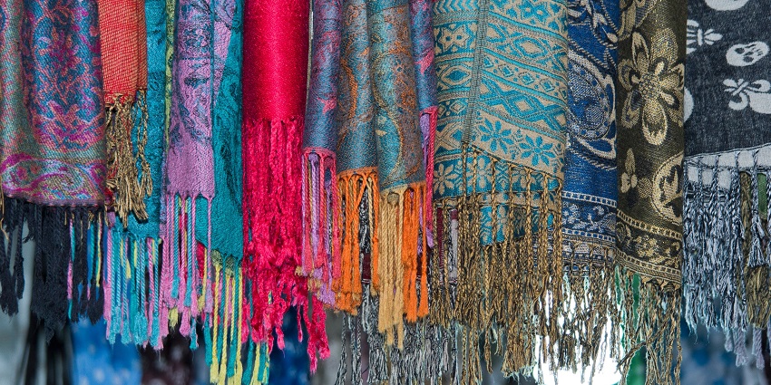 Silk pashmina shawls are neatly displayed at the Zanskar Arts boutique in Leh.
