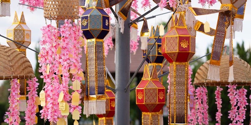Lanna lanterns hanging on a rope for decoration at the Yi Peng Lantern Festival.