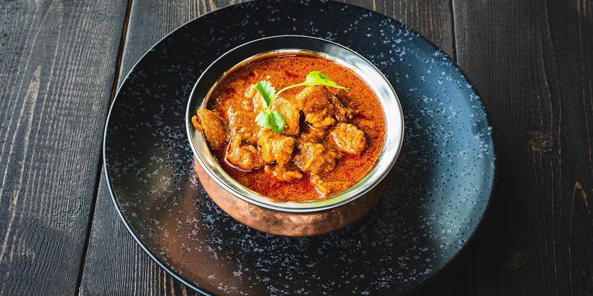 Butter chicken served at April’s Restaurant, one of the top restaurants in Pasighat.
