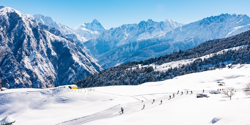 Auli turns into a winter wonderland after snowfall in India in February, ideal for skiing.