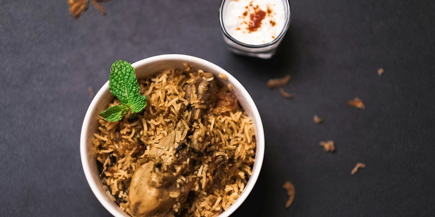 Chicken Biryani with raita served at C Pavilion, one of the popular restaurants in Tezpur.
