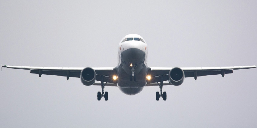 Airplane in the sky at Cochin International Airport in Kerala.
