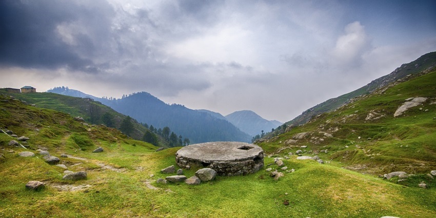 Vibrant landscape of Dalhousie showcasing lush hills and scenic valleys.