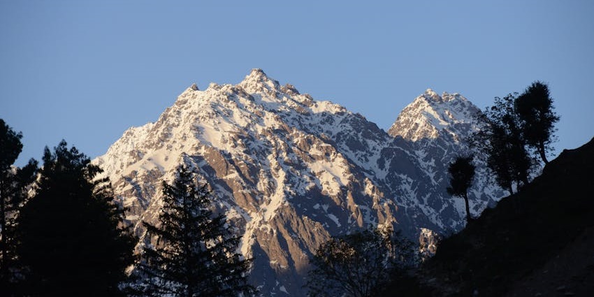 Snowfall in Himachal Pradesh covering the peaceful monasteries and cedar forests of Dharamshala.