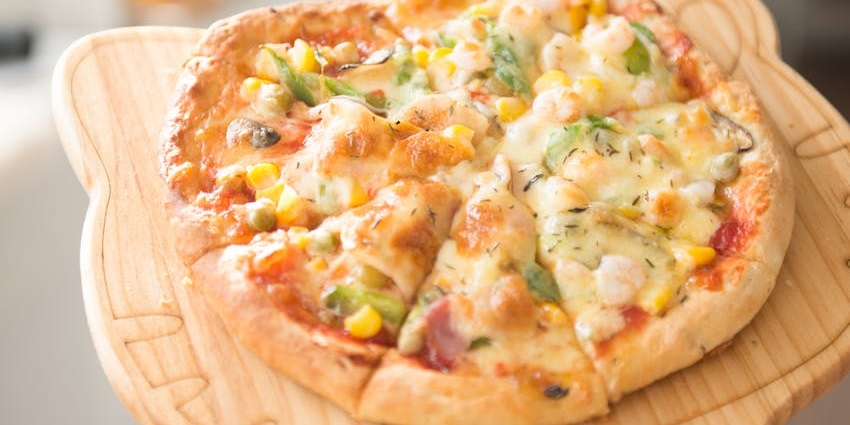 Pizza served at EXORO The Rooftop Pub, one of the finest rooftop restaurants in Guwahati.