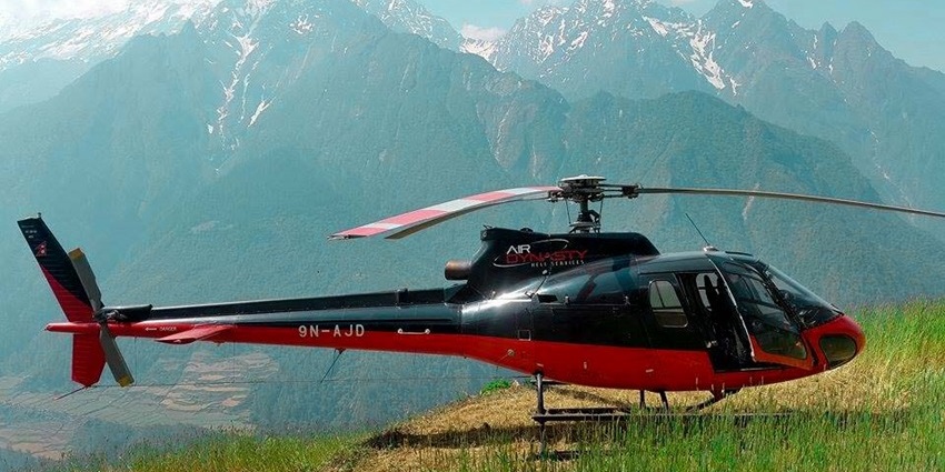 A helicopter amidst the white landscapes during snowfall in Himachal Pradesh