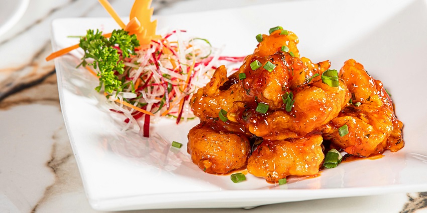 Chilli chicken served hot with spices and herbs at Hotel Tandoor’s restaurant.