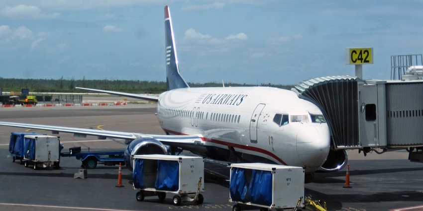 View of an aircraft standing at the Lynden Pindling International Airport.