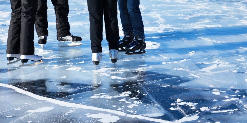 Ice skating on frozen lakes is one of the most amazing things to do on your next trip.