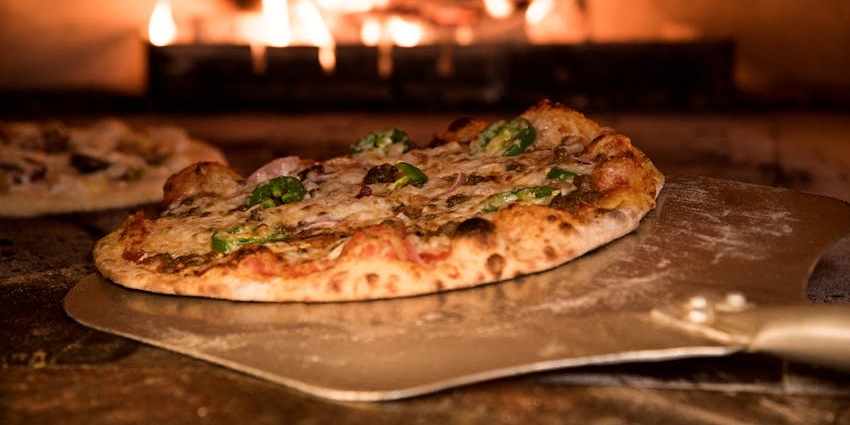 Wood-fired dish served at Levitate Rooftop Restaurant with a cosy dining ambiance.