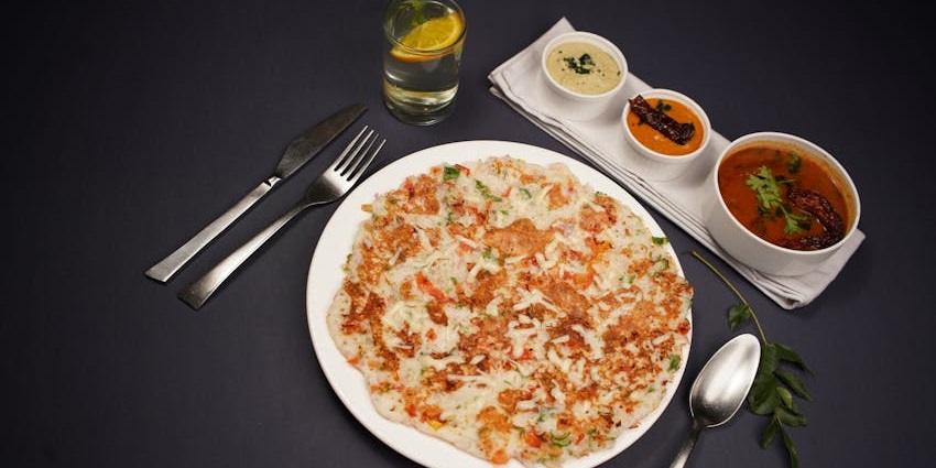 Uttapam with sambhar and chutney served at Madras Café.
