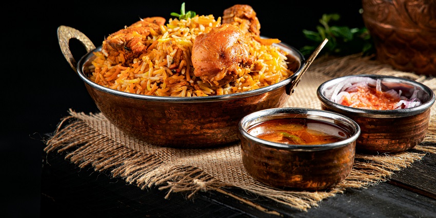 Plate of chicken biryani served at Mughal Delight Restaurant.
