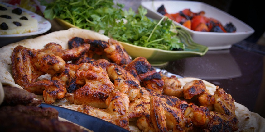 Grilled chicken served at Naga Kitchen, one of the best restaurants in Pasighat.
