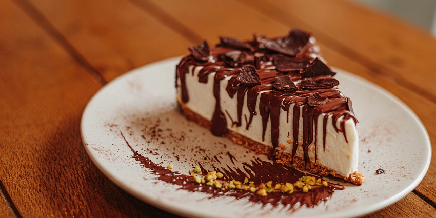 Nutella cheesecake served on a dessert plate at Patisserie Operaa, one of the restaurants in Ulubari Guwahati.